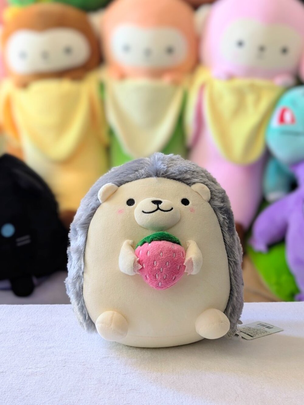 Round 1 Exclusive Takashoji Gray Hedgehog Holding Strawberry Plush